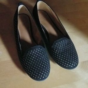 Sold... polka dot on black sued like material